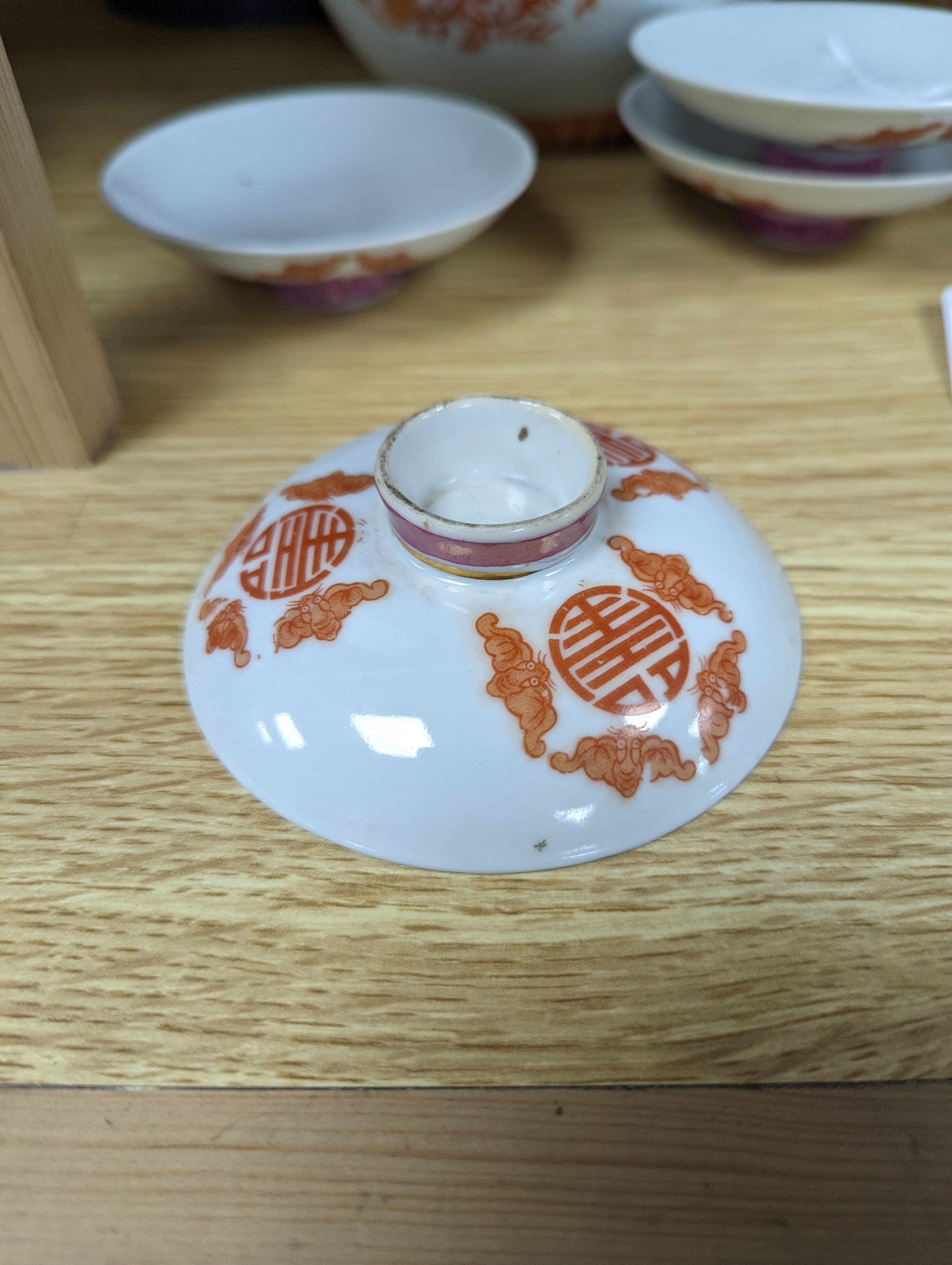 A set of five Chinese teabowls, covers and stands and a similar 'dragon' vase, 23cm